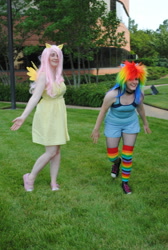 Size: 1944x2896 | Tagged: safe, fluttershy, rainbow dash, human, g4, ama-con, clothes, converse, cosplay, costume, duo, duo female, female, high res, irl, irl human, multicolored hair, photo, rainbow hair, rainbow socks, shoes, socks, striped socks