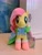 Size: 2389x3185 | Tagged: safe, fluttershy, pegasus, pony, g4, card, clothes, dress, front view, grand galloping gala, irl, kayou, looking at you, merchandise, outfit, photo, plushie, pony plushie, smiling, smiling at you, socks, solo