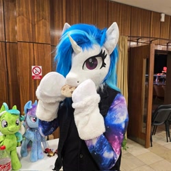 Size: 2048x2048 | Tagged: safe, artist:essorille, artist:vinylpone, dj pon-3, vinyl scratch, human, original species, plush pony, unicorn, anthro, g4, animal costume, arm hooves, blue mane, chest fluff, close-up, clothes, convention, cookie, cosplay, costume, cute, czequestria, equine, female, food, furry, fursuit, hooves, horn, indoors, irl, irl human, mare, messy mane, nom, photo, plushie, ponysuit, purple eyes, ruffled hair, shirt, solo