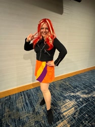 Size: 1536x2048 | Tagged: safe, sunset shimmer, human, everfree northwest, equestria girls, g4, clothes, cosplay, costume, everfree northwest 2024, female, hand on hip, irl, irl human, peace sign, photo, rebecca shoichet, solo, voice actor