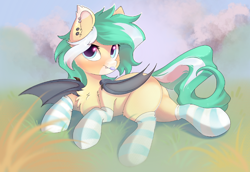 Size: 2900x1992 | Tagged: safe, artist:kebchach, oc, oc only, oc:icy breeze, bat pony, pony, :p, bat pony oc, bat wings, chest fluff, clothes, ear piercing, earring, fangs, female, grass, high res, jewelry, looking at you, lying down, mare, one wing out, piercing, socks, solo, striped socks, tail, tongue out, wings