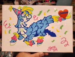 Size: 2048x1536 | Tagged: safe, artist:janegumball, oc, oc only, oc:bash the piñata, piñata pony, pony, everfree northwest, blue body, blue sclera, body markings, bucktooth, cheek fluff, colored hooves, colored sclera, commission, confetti, everfree northwest 2024, facial markings, freckles, hat, hooves, leg markings, looking up, nonbinary oc, party hat, photo, pink eyes, piñata, posca, prancing, profile, signature, smiling, solo, traditional art, white hooves