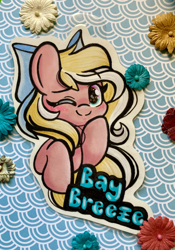 Size: 2532x3614 | Tagged: safe, artist:emberslament, oc, oc only, oc:bay breeze, pegasus, badge, blushing, bow, cute, hair bow, looking at you, one eye closed, pegasus oc, photo, traditional art, wink, winking at you