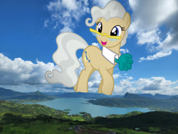 Size: 2048x1536 | Tagged: safe, artist:starryshineviolet, edit, editor:jaredking779, mayor mare, earth pony, pony, g4, collar, cravat, female, giant pony, giantess, glasses, highrise ponies, irl, lake, looking at you, macro, mare, mountain, nature, photo, ponies in real life, raised hoof, smiling, solo, story included, water