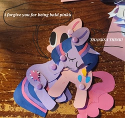 Size: 1764x1666 | Tagged: safe, artist:koidial, part of a set, pinkie pie, twilight sparkle, earth pony, pony, unicorn, g4, 3d cutie mark, bald, big eyes, colored pinnae, craft, curly tail, dialogue, duo, duo female, eyelashes, eyes closed, female, horn, hug, lesbian, maneless, mare, no catchlights, no mane, no pupils, nuzzling, paper doll, papercraft, photo, pink coat, pink tail, purple coat, raised hoof, ship:twinkie, shipping, speech bubble, straight mane, straight tail, tail, talking, text, three toned mane, three toned tail, traditional art, unicorn horn, unicorn twilight, white text, yelling