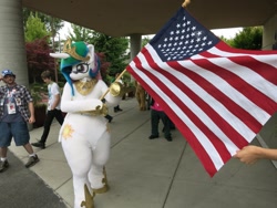 Size: 1221x916 | Tagged: safe, artist:stinken1, artist:toki, princess celestia, human, g4, american flag, clothes, cosplay, costume, flag, fursuit, irl, irl human, photo, ponysuit, thicc thighs, thighs, thunder thighs, united states, wide hips