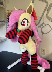 Size: 1714x2384 | Tagged: safe, artist:qtpony, fluttershy, bat pony, pony, g4, apple, bat ponified, bow, clothes, female, flutterbat, food, hair bow, irl, mare, photo, plushie, race swap, rearing, socks, solo, striped socks