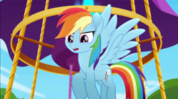 Size: 1280x716 | Tagged: safe, screencap, rainbow dash, pegasus, pony, g4, my little pony: rainbow roadtrip, cute, dashabetes, flying, hot air balloon, open mouth, outdoors, solo, spread wings, wings