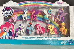 Size: 3145x2092 | Tagged: safe, applejack, fluttershy, pinkie pie, princess cadance, princess celestia, princess flurry heart, rainbow dash, rarity, shining armor, twilight sparkle, alicorn, earth pony, pegasus, unicorn, g4, 2018, collectible, figurine, hasbro, hasbro logo, horn, irl, logo, mane six, merchandise, my little pony logo, packaging, photo, toy, twilight sparkle (alicorn)