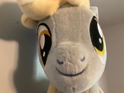 Size: 4032x3024 | Tagged: safe, artist:symbiotestudios, derpy hooves, pegasus, pony, g4, bust, close-up, cute, derpabetes, female, irl, mare, photo, plushie, portrait, smiling, solo, toy