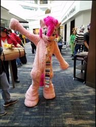 Size: 963x1280 | Tagged: safe, artist:spainfischer, pinkie pie, human, g4, badge, clothes, fursuit, indoors, irl, irl human, photo, ponysuit, shirt, solo, t-shirt