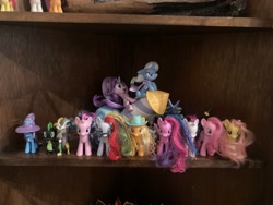 Size: 4032x3024 | Tagged: safe, applejack, discord, fluttershy, pinkie pie, rainbow dash, rarity, spike, starlight glimmer, trixie, twilight sparkle, alicorn, draconequus, dragon, earth pony, pegasus, unicorn, g4, doll, female, horn, indoors, irl, male, mare, photo, rocket, toy, toy interpretation, trixie's rocket, twilight sparkle (alicorn)