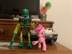 Size: 4032x3024 | Tagged: safe, artist:polorenzielephant, pinkie pie, earth pony, g4, bionicle, female, guardians of harmony, indoors, irl, lego, lewa, male, mare, photo, toa lewa, toy, tugboat