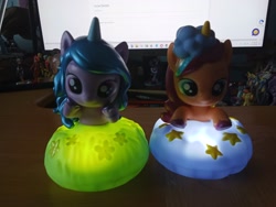 Size: 3264x2448 | Tagged: safe, izzy moonbow, sunny starscout, g5, blind bag, blind bag pony, female, indoors, light up figure, light up horse, mare, toy