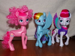 Size: 4608x3456 | Tagged: safe, pinkie pie, rainbow dash, zipp storm, g4, g5, doll, female, g4 to g5, generation leap, indoors, photo, toy, trio, trio female, zipp and her heroine