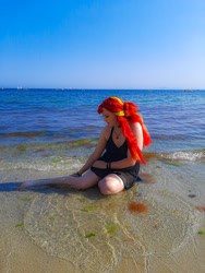 Size: 3000x4000 | Tagged: safe, artist:yuris, sunset shimmer, human, equestria girls, g4, black swimsuit, clothes, cosplay, costume, irl, irl human, nature, ocean, outdoors, photo, sitting, solo, summer, swimsuit, water