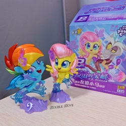 Size: 2915x2915 | Tagged: safe, discord, fluttershy, rainbow dash, butterfly, draconequus, pegasus, pony, g4, g4.5, my little pony: pony life, chibi, china, chinese, kayou, merchandise, music notes