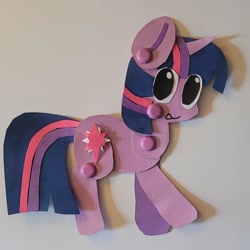 Size: 1485x1485 | Tagged: safe, artist:koidial, part of a set, twilight sparkle, pony, unicorn, g4, 3d cutie mark, bangs, big eyes, colored pinnae, craft, cute, female, horn, irl, looking back, mare, no pupils, paper doll, papercraft, photo, purple coat, smiling, solo, striped mane, striped tail, tail, three toned mane, three toned tail, tongue out, traditional art, twiabetes, unicorn horn, unicorn twilight