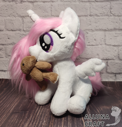 Size: 2320x2410 | Tagged: safe, artist:allunacraft, princess celestia, pony, g4, cewestia, female, filly, irl, mouth hold, photo, plushie, solo, teddy bear, younger