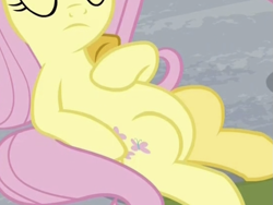 Size: 961x722 | Tagged: safe, screencap, fluttershy, pegasus, pony, 2 4 6 greaaat, g4, belly, cropped, hoof on chest, lying down, on back, pictures of bellies, round belly, solo