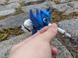 Size: 2048x1536 | Tagged: safe, princess luna, alicorn, human, pony, g4, cigarette, female, irl, irl human, mare, outdoors, photo, toy