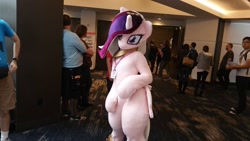 Size: 960x540 | Tagged: safe, princess cadance, alicorn, human, g4, convention, crowd, female, fursuit, indoors, irl, irl human, looking at you, photo, ponysuit, solo focus