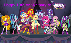 Size: 2043x1226 | Tagged: safe, artist:epiccartoonsfan, artist:matrixchicken, artist:sugar-loop, artist:user15432, adagio dazzle, applejack, aria blaze, fluttershy, pinkie pie, rainbow dash, rarity, sonata dusk, spike, sunset shimmer, trixie, twilight sparkle, alicorn, dog, human, rainbow rocks 10th anniversary, equestria girls, g4, my little pony equestria girls: rainbow rocks, anniversary, clothes, cowboy hat, equestria girls logo, hat, looking at you, microphone, my little pony logo, pegasus wings, ponied up, pony ears, rainbow rocks outfit, smiling, smiling at you, spike the dog, stage, the dazzlings, the rainbooms, twilight sparkle (alicorn), wings