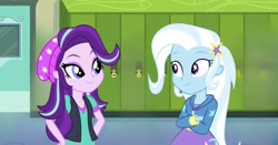 Size: 1120x585 | Tagged: safe, edit, edited screencap, screencap, starlight glimmer, trixie, human, equestria girls, g4, canterlot high, duo, duo female, female, indoors, lesbian, lockers, ship:startrix, shipping