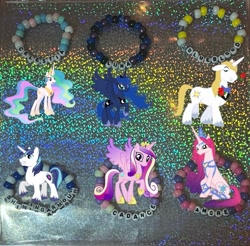 Size: 733x720 | Tagged: safe, artist:lnx1ynight16, part of a set, prince blueblood, princess amore, princess cadance, princess celestia, princess luna, shining armor, alicorn, pony, unicorn, g4, female, horn, irl, kandi, photo, royal sisters, royalty, siblings, sisters, smiling