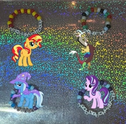 Size: 726x714 | Tagged: safe, artist:lnx1ynight16, part of a set, discord, starlight glimmer, sunset shimmer, trixie, draconequus, pony, unicorn, g4, horn, irl, kandi, photo, reformed, smiling