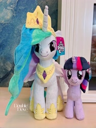 Size: 2965x3953 | Tagged: safe, princess celestia, twilight sparkle, alicorn, pony, g4, official, double dove, duo, duo female, female, front view, horn, indoors, irl, jewelry, looking at you, looking up, merchandise, photo, plushie, pony plushie, smiling, standing, tiara, twilight sparkle (alicorn), wings