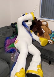 Size: 1402x2000 | Tagged: safe, artist:atalonthedeer, artist:kandathebear, princess celestia, g4, couch, fursuit, indoors, irl, jewelry, photo, ponysuit, regalia, sitting, solo