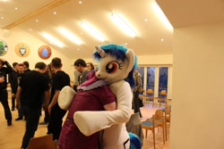 Size: 2074x1382 | Tagged: safe, artist:atalonthedeer, dj pon-3, vinyl scratch, human, g4, 2013, duo focus, fursuit, indoors, irl, irl human, photo, ponysuit, red eyes, wwu