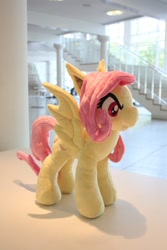 Size: 848x1272 | Tagged: safe, fluttershy, bat pony, galacon, g4, 2015, bat ponified, flutterbat, indoors, irl, photo, plushie, race swap