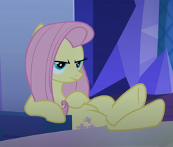 Size: 630x538 | Tagged: safe, screencap, fluttershy, g4, my little pony: friendship is magic, to where and back again, cropped, disguise, disguised changeling, hooves on the table, sitting, solo, unamused