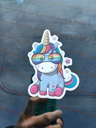 Size: 3000x4000 | Tagged: safe, rainbow dash, human, pony, unicorn, g4, colored hooves, glasses, hooves, horn, irl, irl human, looking at you, multicolored hair, not rainbow dash, offscreen character, offscreen human, photo, rainbow glasses, rainbow hair, solo, sticker, unshorn fetlocks