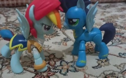 Size: 720x447 | Tagged: safe, rainbow dash, soarin', pegasus, pony, g4, duo, duo male and female, female, male, mare, ship:soarindash, shipping, stallion, straight, toy