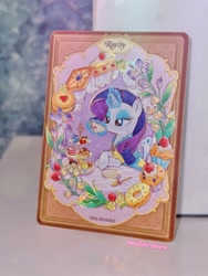 Size: 2206x2941 | Tagged: safe, rarity, pony, unicorn, g4, official, afternoon tea, cake, card, clothes, cup, dessert, double dove, dress, flower, food, horn, irl, kayou, looking down, magic, magic aura, merchandise, outfit, photo, plate, solo, teacup, text