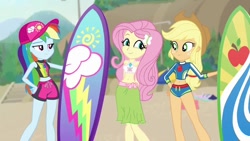 Size: 1280x720 | Tagged: safe, artist:ocean lover, edit, edited screencap, screencap, applejack, fluttershy, rainbow dash, human, blue crushed, equestria girls, g4, my little pony equestria girls: better together, applejack's beach shorts swimsuit, applejack's hat, arm behind back, bare midriff, bare shoulders, beach, beach babe, beautiful, belly, belly button, bikini, bikini babe, bikini top, blonde hair, blue eyes, board, butterfly hairpin, cap, clothes, cowboy hat, cutie mark on clothes, geode of super speed, geode of super strength, green eyes, hair ornament, hat, hill, lidded eyes, long hair, looking at each other, looking at someone, magenta eyes, magical geodes, midriff, ms paint, multicolored hair, pink hair, pretty, rainbow dash's beach shorts swimsuit, rainbow hair, sand, sarong, sleeveless, stetson, surfboard, swimming trunks, swimsuit, swimsuit edit