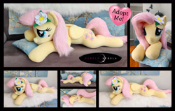 Size: 6000x3820 | Tagged: safe, artist:purplenebulastudios, fluttershy, pony, g4, flower, flower in hair, irl, lying down, photo, plushie, prone, solo