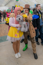 Size: 1281x1920 | Tagged: safe, discord, fluttershy, human, g4, 2016, brony fair, clothes, cosplay, costume, irl, irl human, photo, plushie