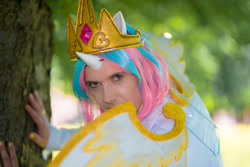 Size: 1920x1281 | Tagged: safe, princess celestia, human, galacon, g4, 2016, clothes, cosplay, costume, crown, horn, irl, irl human, jewelry, looking at you, outdoors, photo, regalia, solo, tree, wings