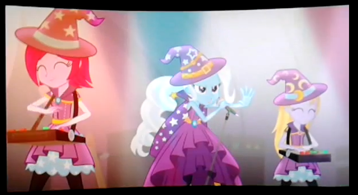 https://derpicdn.net/img/view/2014/9/28/730833__safe_trixie_equestria+girls_rainbow+rocks_spoiler-colon-rainbow+rocks_background+human_rainbow+rocks+outfit_fuchsia+blush_lavender+lace_trixie+and+the+illusions.png